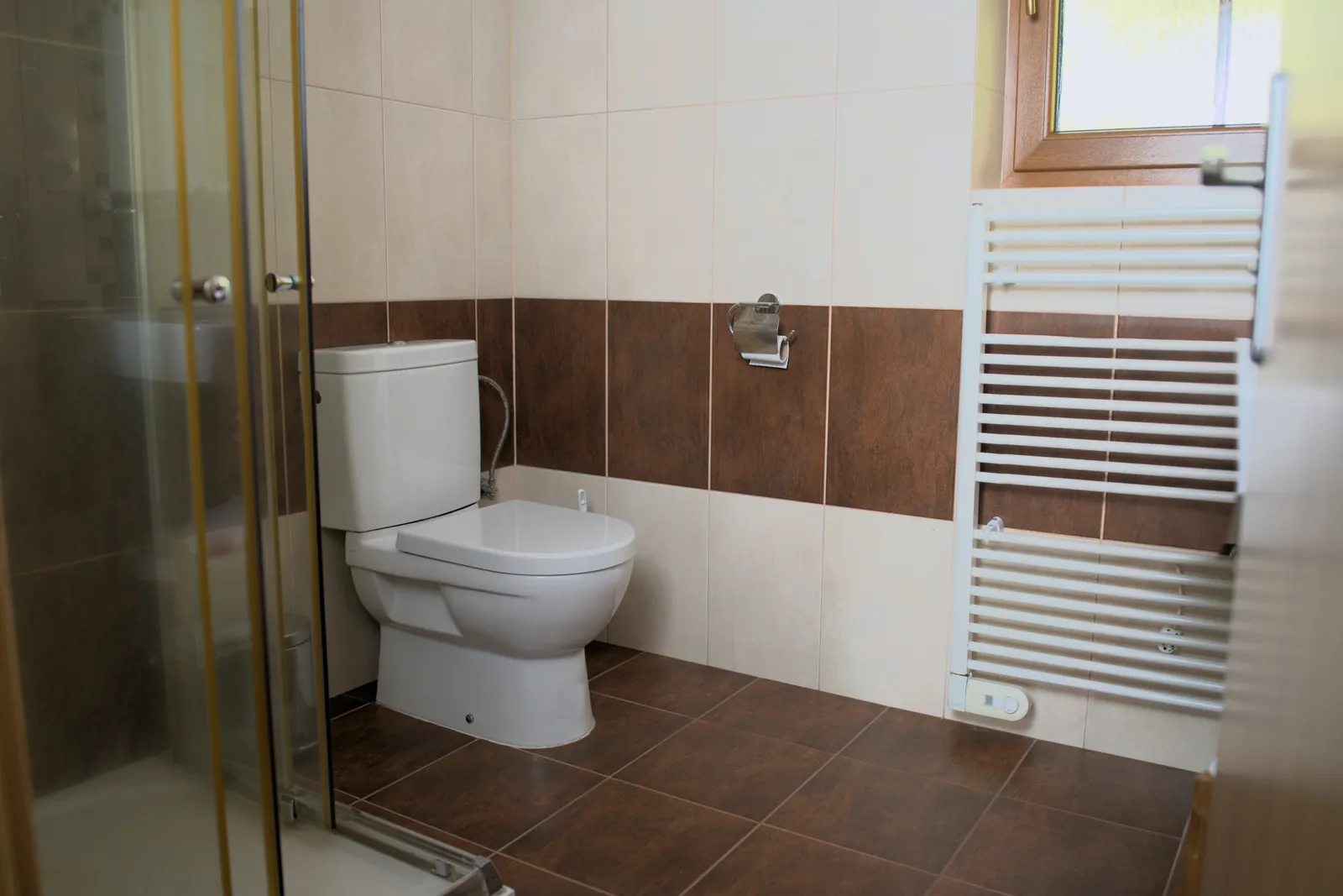 Koupelna Apartmánu 1 se sprchovým koutem